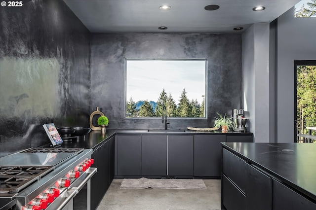 kitchen with sink and range with two ovens