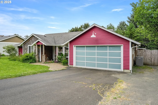 3664 W Chinook Ave, Cannon Beach, OR 97110 - ranch-style house with asphalt driveway and a garage
