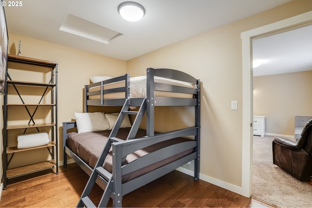 3664 W Chinook Ave, Cannon Beach, OR 97110 - bedroom featuring wood finished floors and attic access