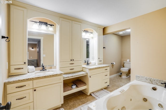 3664 W Chinook Ave, Cannon Beach, OR 97110 - full bathroom with a jetted tub, vanity, and tile patterned flooring