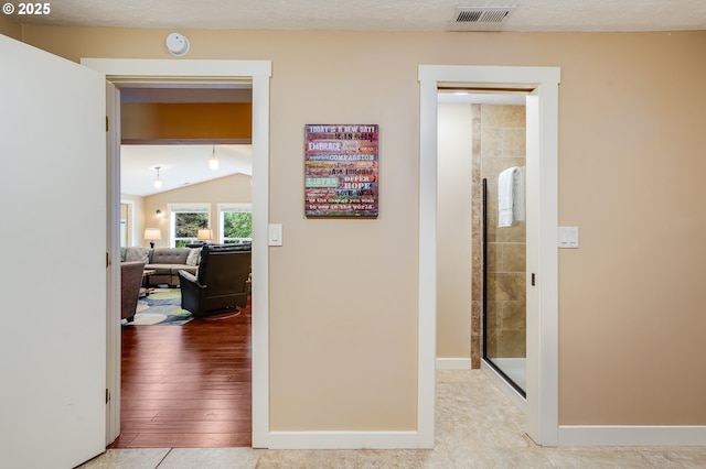 3664 W Chinook Ave, Cannon Beach, OR 97110 - corridor featuring vaulted ceiling and baseboards