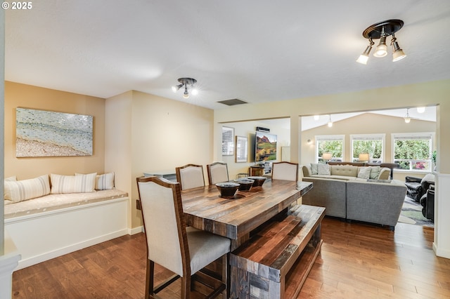 3664 W Chinook Ave, Cannon Beach, OR 97110 - dining space featuring wood finished floors and vaulted ceiling