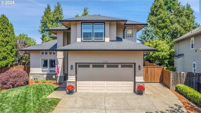 23836 SW Warbler Pl, Sherwood, OR 97140 - prairie-style house with concrete driveway, a shingled roof, a garage, and stone siding