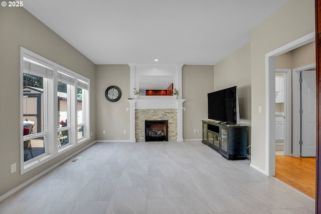 23836 SW Warbler Pl, Sherwood, OR 97140 - unfurnished living room with a fireplace, baseboards, and recessed lighting