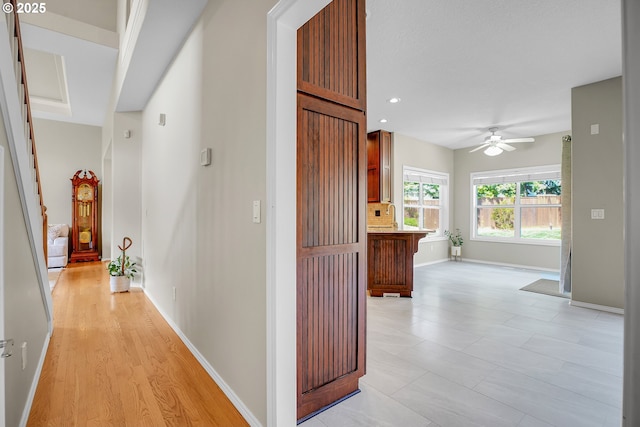 23836 SW Warbler Pl, Sherwood, OR 97140 - hallway with baseboards, stairs, and recessed lighting