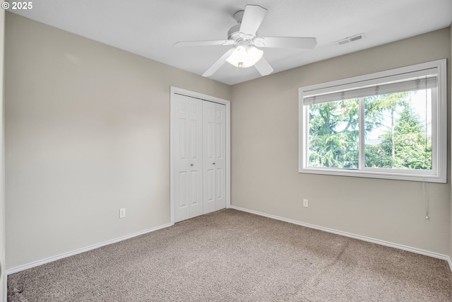 23836 SW Warbler Pl, Sherwood, OR 97140 - unfurnished bedroom featuring carpet, baseboards, a closet, and a ceiling fan