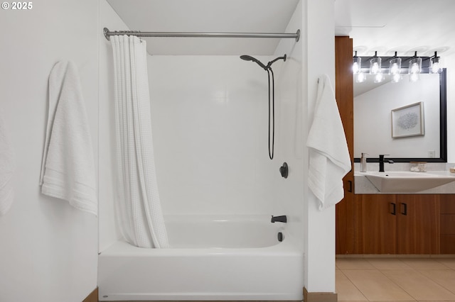 bathroom featuring tile patterned floors, shower / bathtub combination with curtain, and vanity