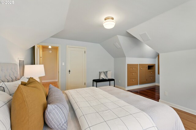 2804 NE 46th Ave, Portland, OR 97213 - bedroom featuring wood finished floors, baseboards, and lofted ceiling