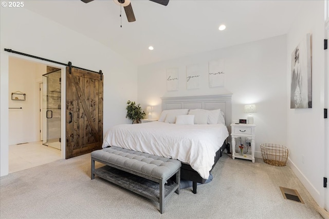 bedroom featuring visible vents, light carpet, ceiling fan, recessed lighting, and a barn door