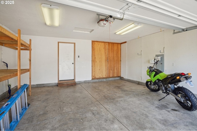 1041 40th St, Washougal, WA 98671 - garage with a garage door opener and baseboards