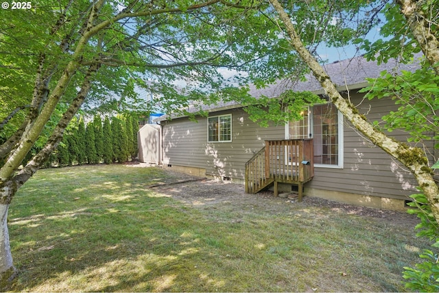 1041 40th St, Washougal, WA 98671 - back of house with a yard and a shingled roof