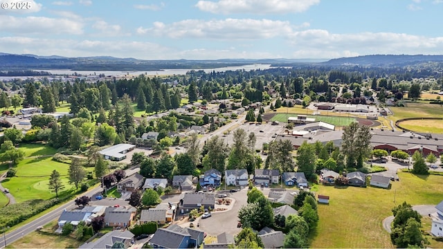 1041 40th St, Washougal, WA 98671 - aerial perspective of suburban area featuring a mountainous background