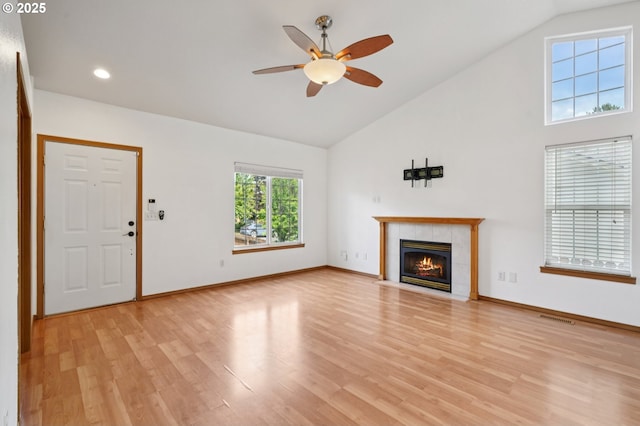1041 40th St, Washougal, WA 98671 - unfurnished living room with a ceiling fan, high vaulted ceiling, a fireplace, light wood-style flooring, and recessed lighting