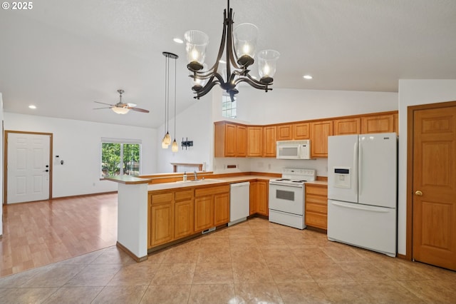 1041 40th St, Washougal, WA 98671 - kitchen featuring white appliances, ceiling fan, light countertops, a chandelier, and pendant lighting