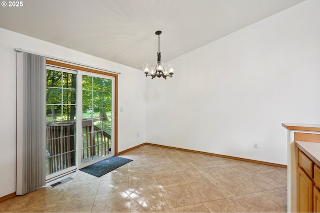 1041 40th St, Washougal, WA 98671 - unfurnished dining area featuring a chandelier and light tile patterned floors