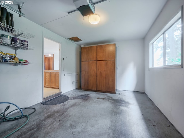 2830 Capital Dr, Eugene, OR 97403 - garage featuring a garage door opener