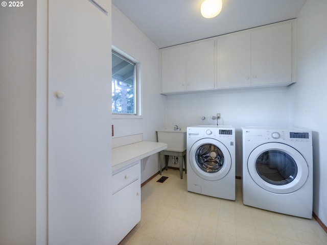 2830 Capital Dr, Eugene, OR 97403 - washroom featuring cabinet space, washer and clothes dryer, and light floors
