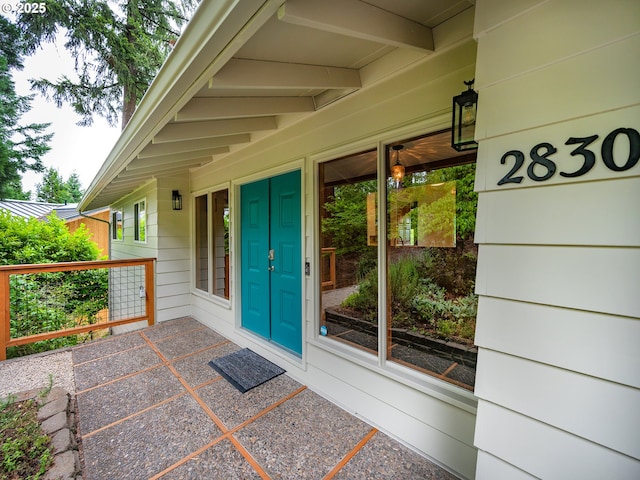 2830 Capital Dr, Eugene, OR 97403 - doorway to property with uncovered parking and a porch