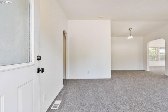 9341 N Pier Park Pl, Portland, OR 97203 - carpeted spare room featuring arched walkways and baseboards