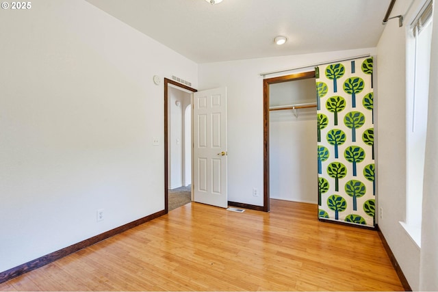 9341 N Pier Park Pl, Portland, OR 97203 - unfurnished bedroom featuring light wood-style flooring and a closet