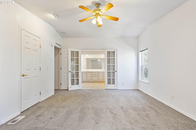 9341 N Pier Park Pl, Portland, OR 97203 - carpeted spare room featuring french doors and a ceiling fan