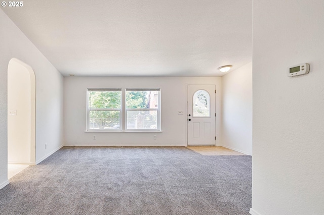 9341 N Pier Park Pl, Portland, OR 97203 - entryway featuring carpet flooring and arched walkways