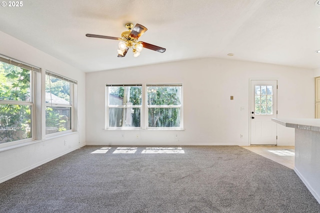 9341 N Pier Park Pl, Portland, OR 97203 - unfurnished living room featuring lofted ceiling, ceiling fan, and light colored carpet