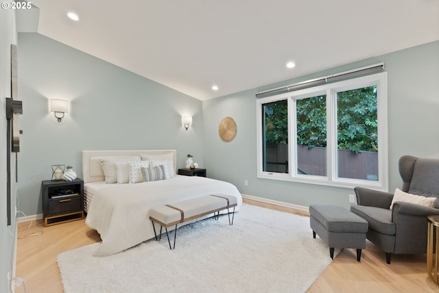 17595 Kelok Rd, Lake Oswego, OR 97034 - bedroom with light wood-type flooring, baseboards, recessed lighting, and lofted ceiling