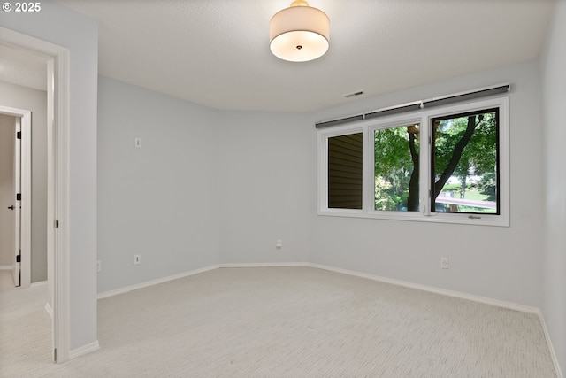 17595 Kelok Rd, Lake Oswego, OR 97034 - empty room with light carpet and baseboards