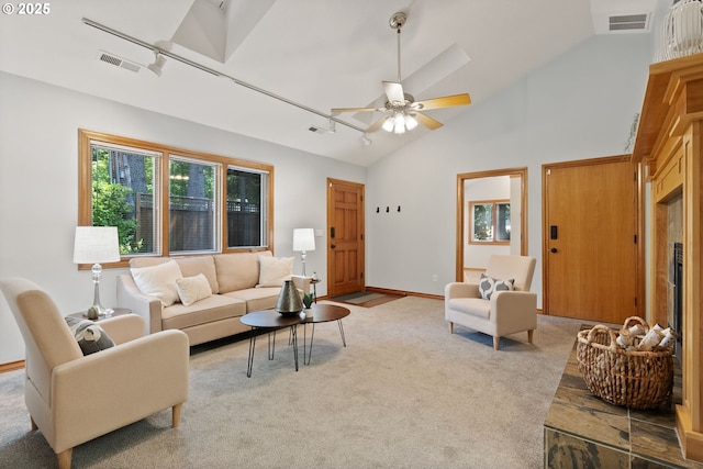 17595 Kelok Rd, Lake Oswego, OR 97034 - carpeted living room featuring a ceiling fan and high vaulted ceiling