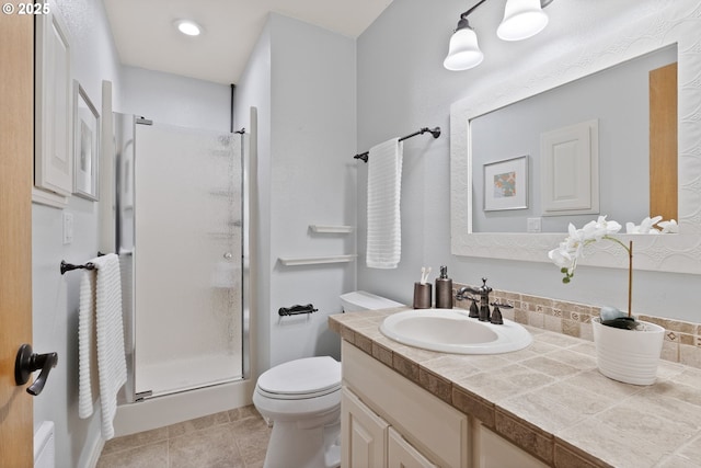 17595 Kelok Rd, Lake Oswego, OR 97034 - full bath featuring a stall shower, vanity, toilet, and tile patterned flooring