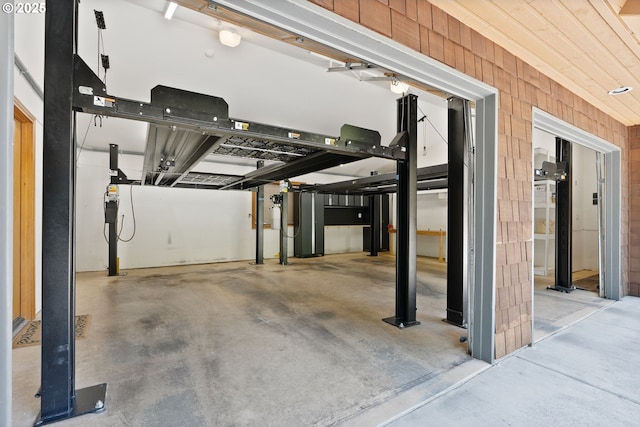 17595 Kelok Rd, Lake Oswego, OR 97034 - garage featuring wood walls