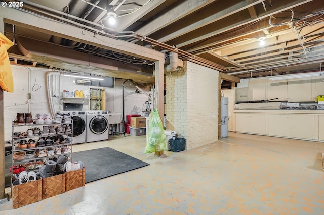 992 SW Westwood Dr, Portland, OR 97239 - unfinished basement featuring independent washer and dryer, a sink, and secured water heater