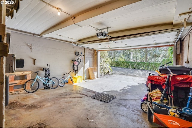 992 SW Westwood Dr, Portland, OR 97239 - garage featuring a garage door opener