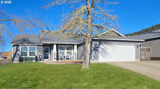 single story home with a garage and a front lawn