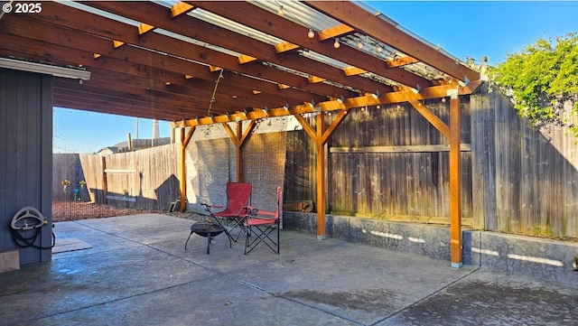 view of patio / terrace with an outdoor fire pit