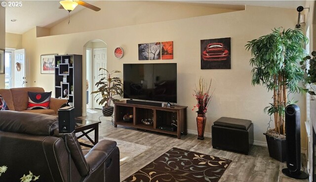 6004 Quartz Ave, Springfield, OR 97478 - living room with arched walkways, ceiling fan, vaulted ceiling, wood finished floors, and baseboards