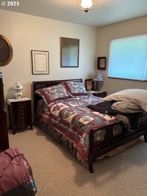 89384 Sutton Lake Rd, Florence, OR 97439 - bedroom featuring light colored carpet