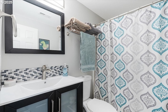 20657 SW Nantucket Ln, Beaverton, OR 97006 - full bath with decorative backsplash, toilet, vanity, and a shower with shower curtain