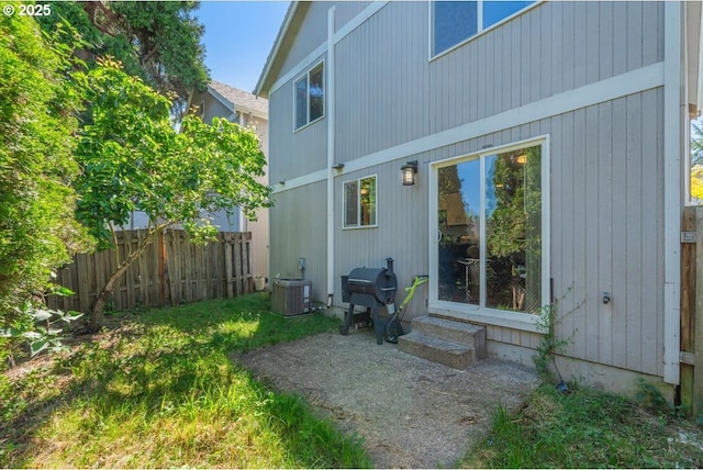 20657 SW Nantucket Ln, Beaverton, OR 97006 - back of property featuring entry steps and central AC unit