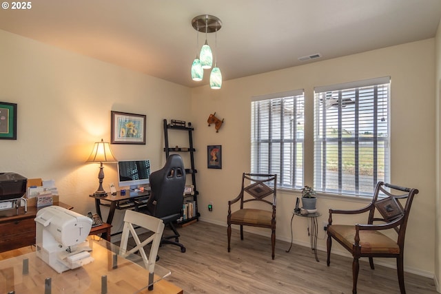 120 Sundance Ct, Roseburg, OR 97471 - office featuring plenty of natural light, wood finished floors, and baseboards