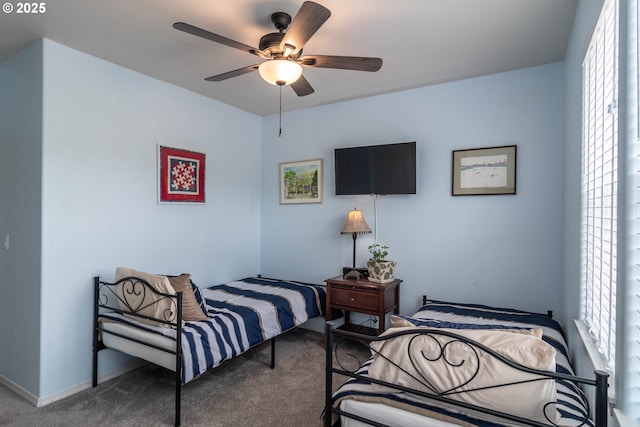 120 Sundance Ct, Roseburg, OR 97471 - carpeted bedroom with ceiling fan and baseboards