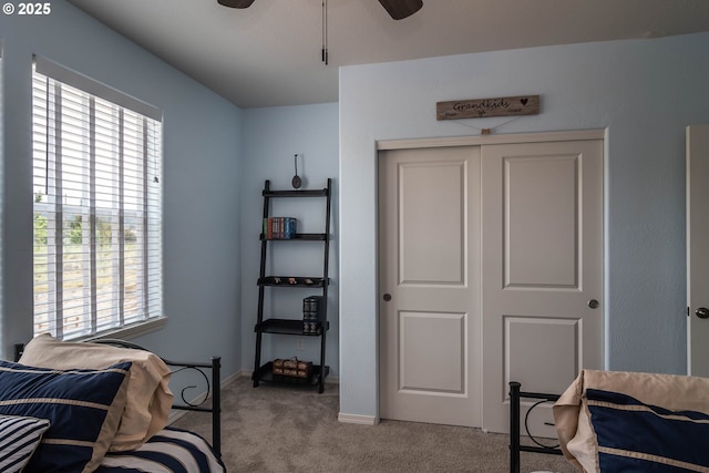120 Sundance Ct, Roseburg, OR 97471 - bedroom featuring light colored carpet, multiple windows, a closet, and baseboards