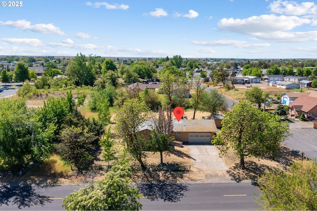 600 NE Oregon Ave, Irrigon, OR 97844 - aerial perspective of suburban area with a tree filled landscape