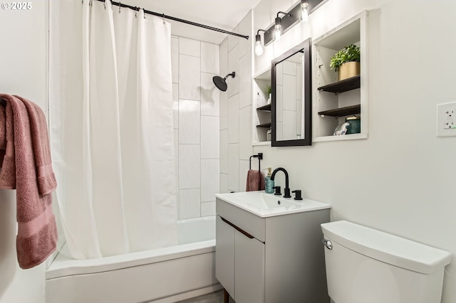 full bathroom with toilet, vanity, and shower / bath combination with curtain