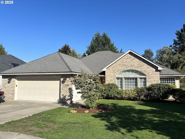 1350 Hidden Creek Dr NE, Keizer, OR 97303 - single story home featuring brick siding, an attached garage, a front yard, and concrete driveway