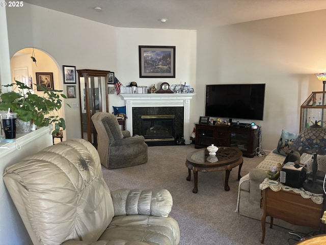 1350 Hidden Creek Dr NE, Keizer, OR 97303 - living area with carpet floors, arched walkways, and a premium fireplace