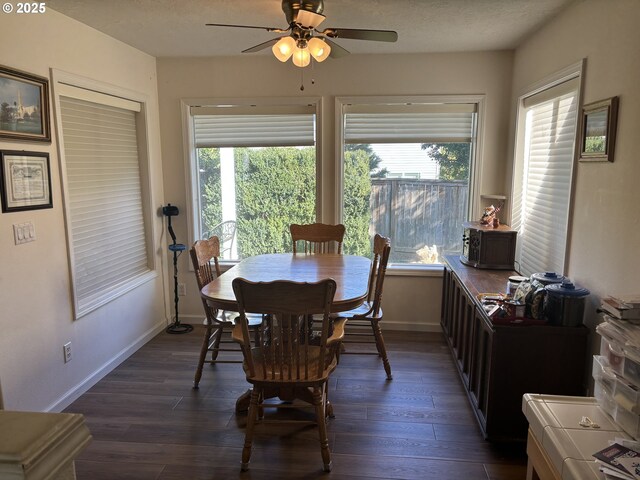 1350 Hidden Creek Dr NE, Keizer, OR 97303 - dining room with ceiling fan, baseboards, and dark wood-type flooring