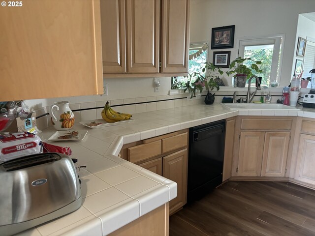 1350 Hidden Creek Dr NE, Keizer, OR 97303 - kitchen featuring black dishwasher, a sink, dark wood finished floors, and light countertops