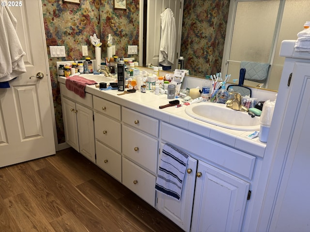 1350 Hidden Creek Dr NE, Keizer, OR 97303 - full bath with wallpapered walls, double vanity, and wood finished floors